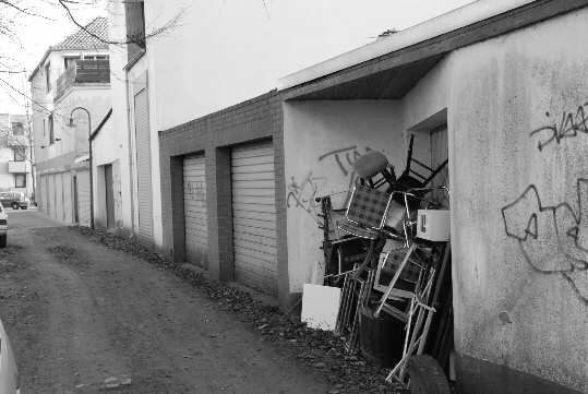 Garages at the rear of a big townhouses