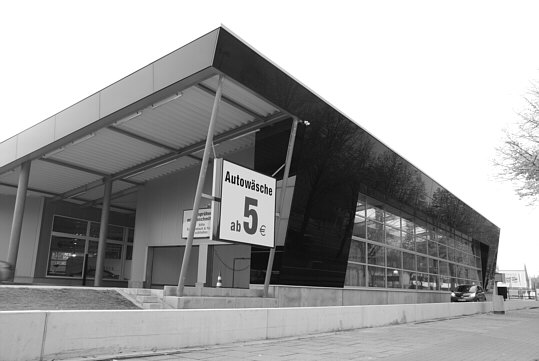 a big hall where cars are washed
