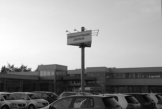 This photograph show the size of a used car center.