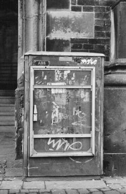 Empty advertising poster frame on a switch box