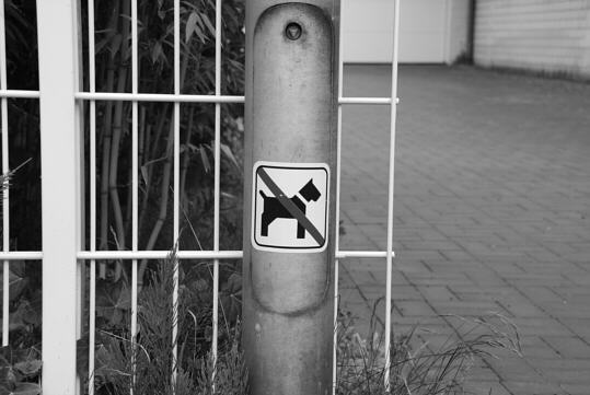 prohibition sign at a plot boundary