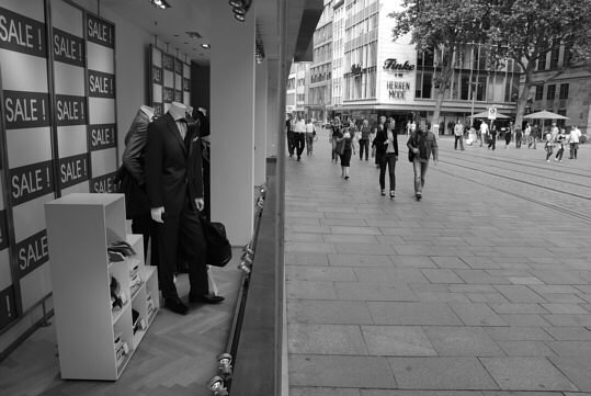 store window and sidewalk